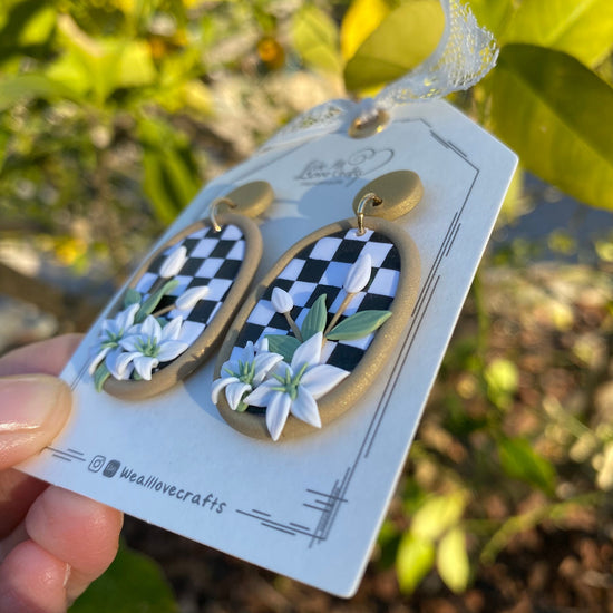 Load image into Gallery viewer, Black and White Checkerboard background Polymer Clay handmade earrings with Lily flower/14k s925 sterling sliver mod clay/Geometry Statement
