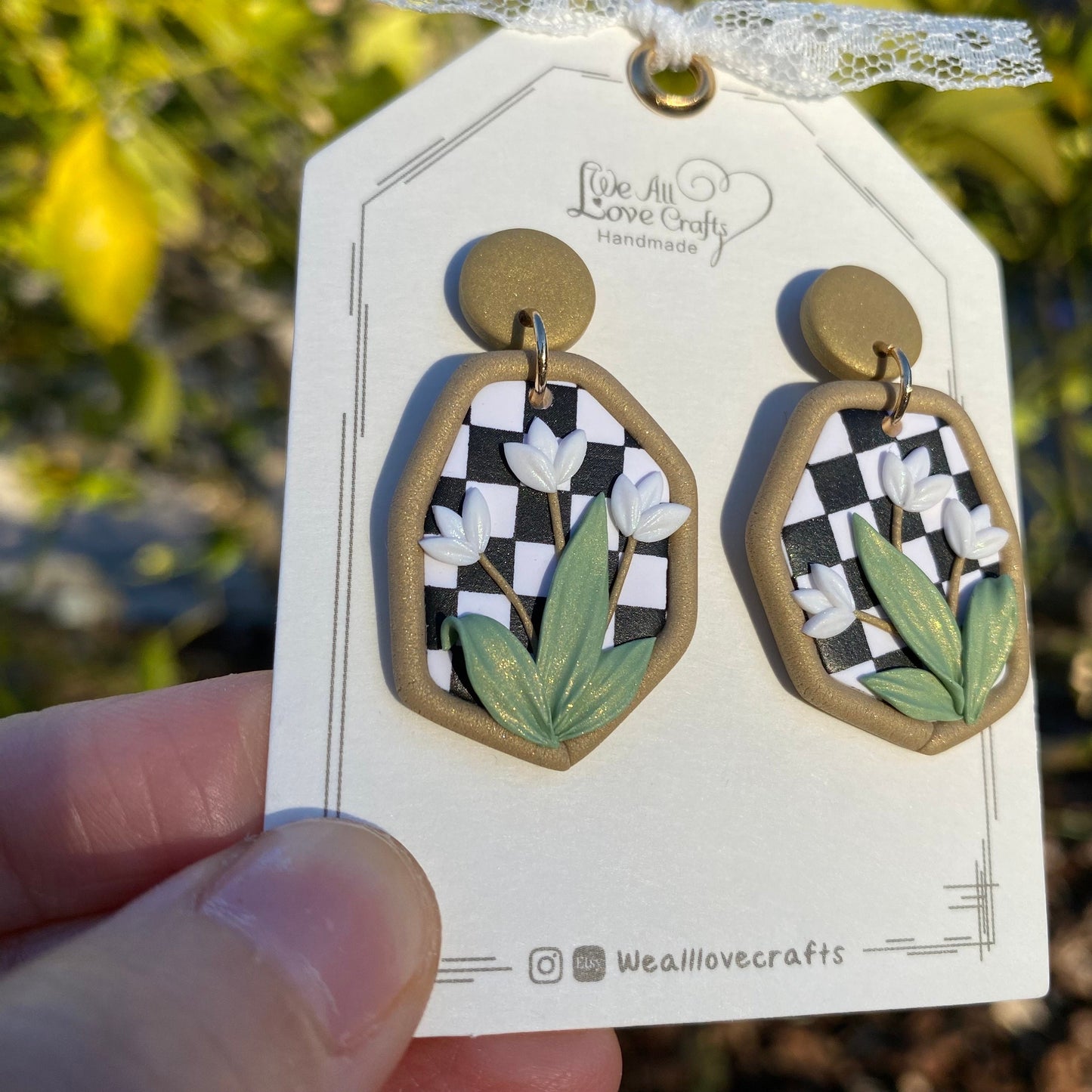 Load image into Gallery viewer, Black and White Checkerboard background Polymer Clay handmade earrings with white Lily flower/Hexagon Irregular shape/Geometry Statement
